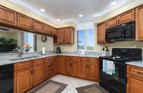 Mid Island Apartment | Immaculate Gated Community Condo - Just Across the Street from the Beach! condo
