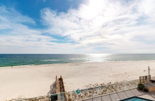 Ono Island House | Inviting Gulf-front condo In Perdido Key with waterfront pool hot tub and oceanfront balcony