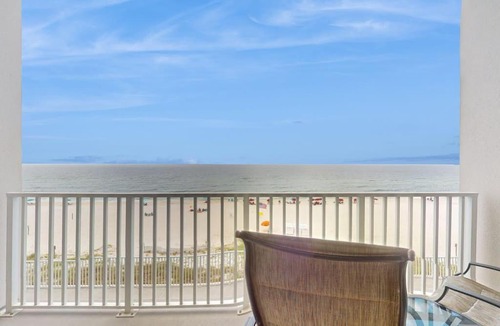 Ono Island House | Inviting Gulf-front condo In Perdido Key with waterfront pool hot tub and oceanfront balcony