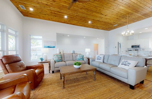 Sawgrass Pointe House | Inviting waterfront home with balcony, full kitchen, central AC, & W/D