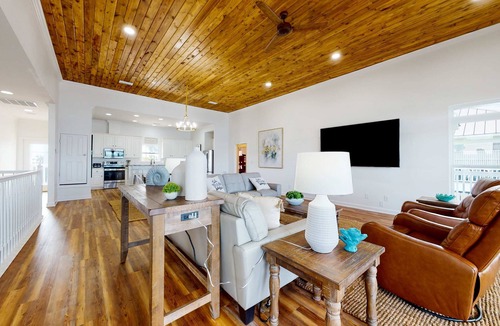 Sawgrass Pointe House | Inviting waterfront home with balcony, full kitchen, central AC, & W/D