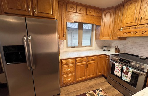 Winchester House | Lakefront home, covered dock with swings, peaceful, quiet, wide cove.