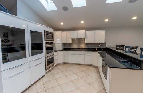 La Porte House | Lakefront Tech-savvy Home with Pool & Hot Tub