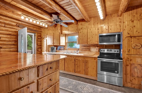 Mayhew Cabin | “Logged Out”- Log Cabin Rental