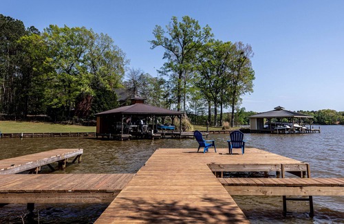 Eatonton House | Luxe Lakefront Home with Private Hot Tub, Dock, Kayaks & Firepit - Dogs OK