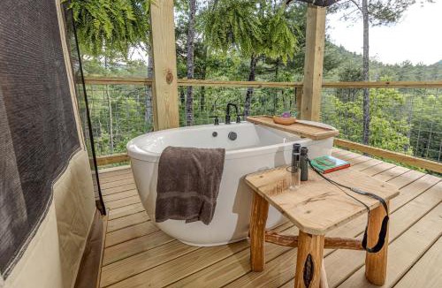 Zirconia House | Luxury Family Tree Tent with Private Deck, Soaking Tub & Pizza Oven Near Waterfalls, Zirconia, North Carolina