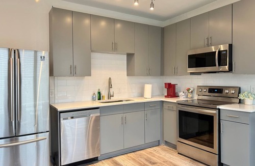 Old Fourth Ward Condo | Modern 4BR Penthouse in Old Fourth Ward | Rooftop + W/D