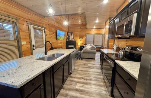 Sevierville Cabin | Modern Smoky Mtn Cabin | Hot Tub | Game Room | 85" TV | Sunset Deck | Sleeps 11