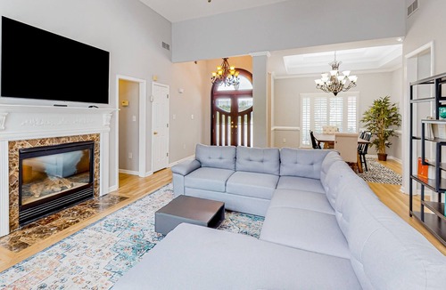 East Point House | Multi-level home with an in-home theater, fireplace, & enclosed yard - dogs ok