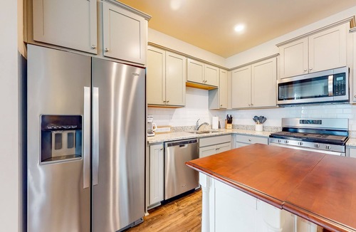 Ocean View House | Ocean View Beach Club townhome with WiFi, private patio, shared pool, & sauna