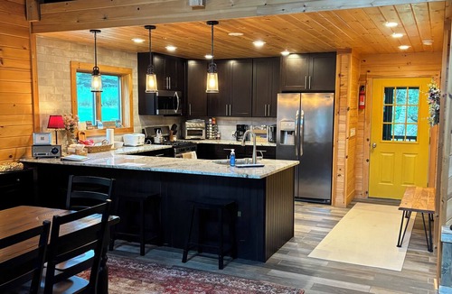 Adirondack House | Peaceful Schroon Lake getaway with cozy comforts and year-round adventures.