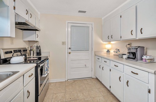 Darien House | Relax in Style: 3BR Home w/Screened Patio, Walk to Downtown, Boat Parking Here!