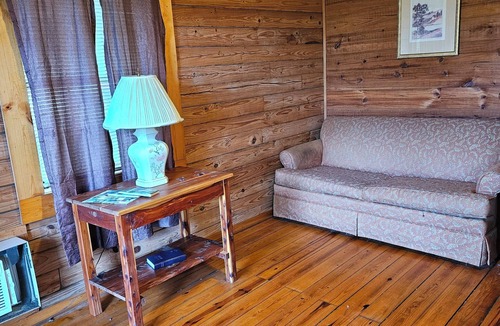 Mammoth Spring Cabin | Riverview Cabins viewing Mammoth Spring State Park and Hatchery