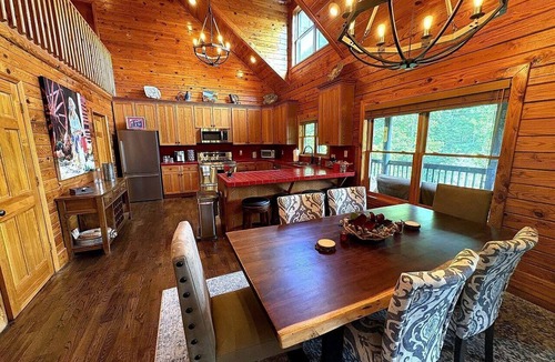 Mount Airy Cabin | Rustic Log Cabin with Hot Tub & Wraparound Porch in Mount Airy, North Carolina