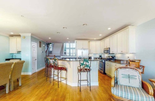 Fenwick Island House | Salt Meadows townhouse w/elevator, gas fireplace & community pool and pier