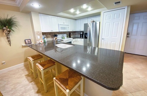 Punta Rassa Condo | Sanibel Harbour Resort Bay View Tower 532: Waterfront condo overlooking the private beach.