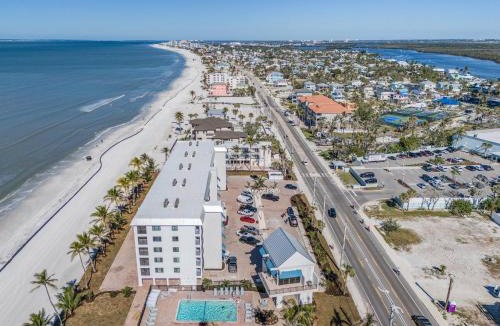 Mid Island Apartment | Seaside 209- Oceanview 2BR 2BA Condo with Pool, Steps to Beach condo