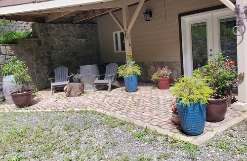 Waynesville Apartment | Secluded, peaceful property with waterfall feature and mountain views.