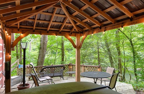 Sevierville Cabin | Secluded Riverfront Cabin Sounds of the River Screened Porch Gazebo Hot Tub