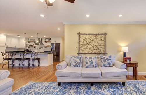 Dandridge Cabin | Serene lake views featuring a private dock, sun deck + spacious fire pit