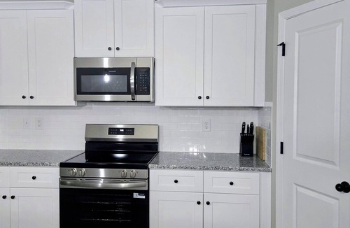 Davis Lake - Eastfield House | Spacious 4-bedroom townhome in Charlotte ;Close to shopping and fun places.