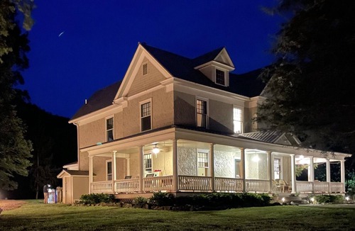 Hot Springs House | Spacious Mountain Farmhouse | Creek | Hot Tub | Fireplaces | In Town