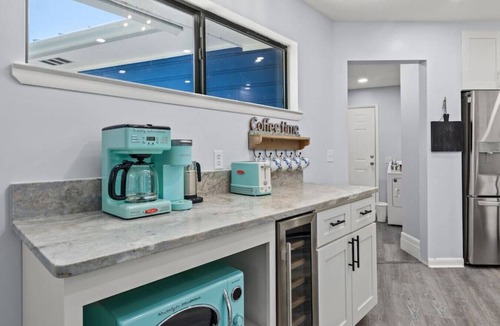 Riviera Beach Cottage | The Blue Lagoon ~ Pet-Friendly with Pool & Close to Beach