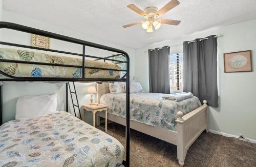 West Panama City Beach House | The Salty Suite Beach House- heated pool! hot tub! pet and family friendly! No elevators! Park at your door!