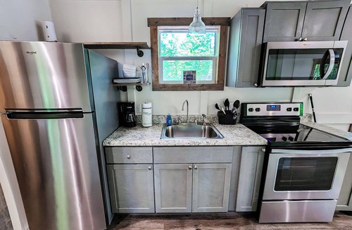 Guntersville Apartment | Tiny House Glamping Retreat- 670+ Acres Private Property on Lake Guntersville