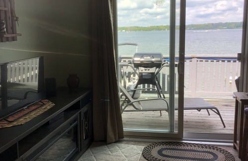 Manitou Beach-Devils Lake Cottage | Two Bed Rooms with a sunrise lakefront view