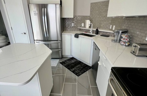 West End Condo | Ultra modern stylish LOFT close to everything! Parking, balcony, fireplace, Wifi