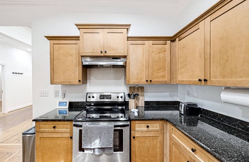 Eagan Park House | Updated home with porch, private parking & AC - minutes to ATL & near airport