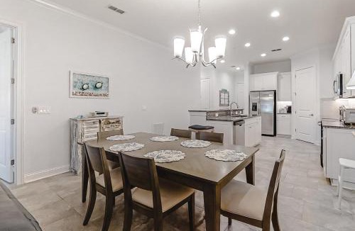 American Beach House | Updated Townhome near the Ocean w/Private Patio, Shared Pool, Central A/C