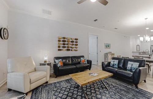 American Beach House | Updated Townhome near the Ocean w/Private Patio, Shared Pool, Central A/C