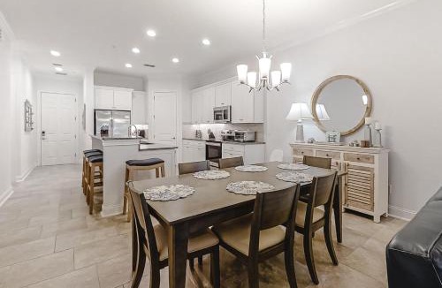 American Beach House | Updated Townhome near the Ocean w/Private Patio, Shared Pool, Central A/C
