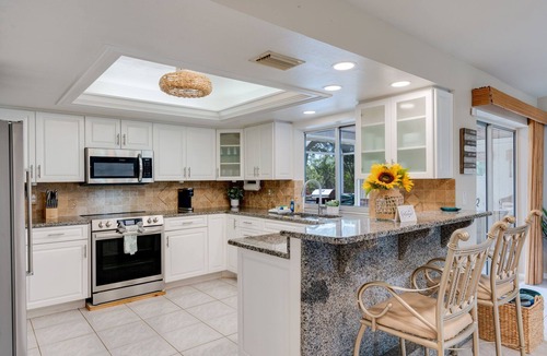 Burnt Store House | Waterfront Oasis - Fish from Backyard, Heated Pool & Spa