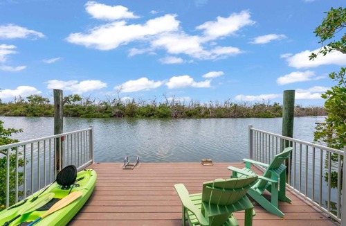 Captiva House | Waterfront Pink House with Private Dock & Pool