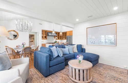 West Beach Cottage | Waterfront! Renovated, river view, community pool and dock