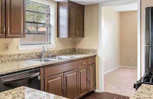 Slidell House | Your choice of room w/a private bathroom and dedicated half-bath.