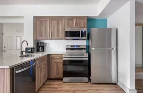 West Kissimmee Hotel | Your Next Favorite Vacation Spot Is Ready to Welcome You! Outdoor Pool, Kitchen!