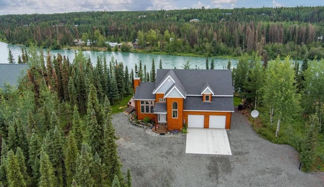 Beautiful 4 Bedroom Home secluded on the Kenai River with improved road access in Soldotna