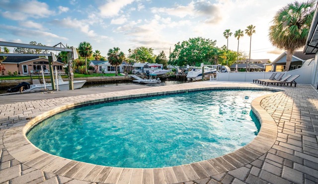 Canal Front Getaway | Pool, Dock, Game Room + Screened Porch