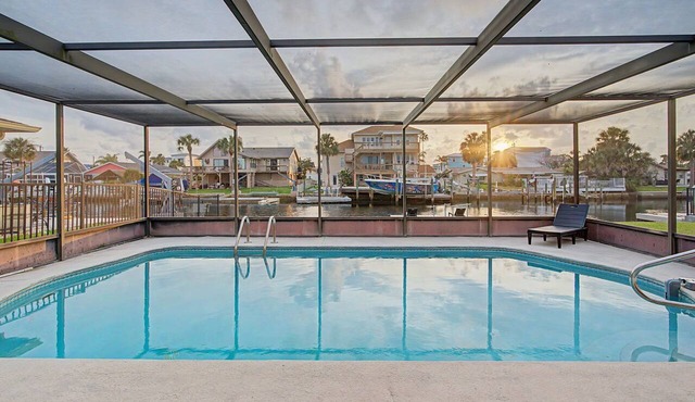 Canal Front Retreat | Private Pool, Dock, and Game Room