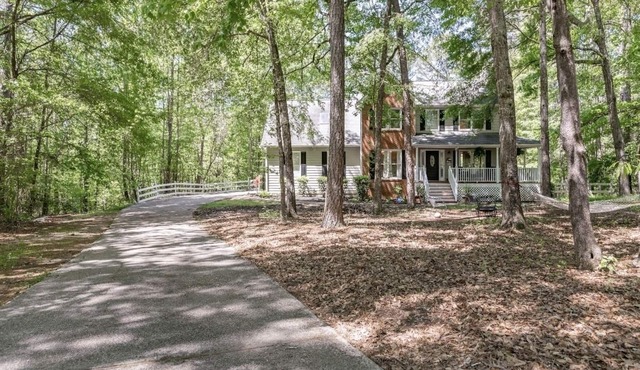 Charming home with above ground pool.