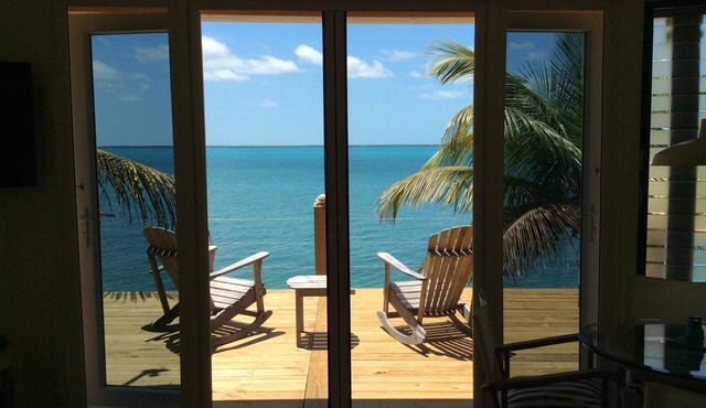 Coco Nut Tree House is nestled in Tropical Foliage on Crystal Clear Sea of Abaco in Green Turtle Cay