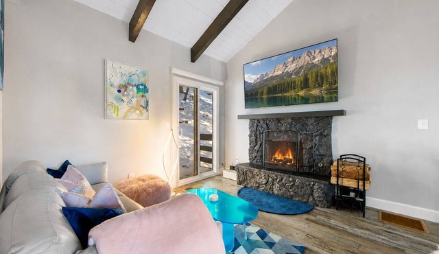 Colorful home with washer/dryer, AC & wood-burning fireplace in a lovely setting