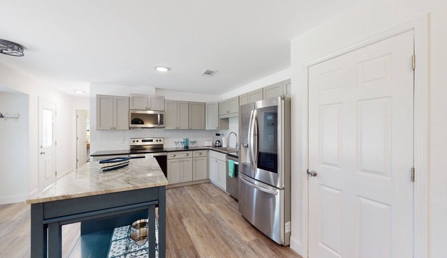 Dog-friendly home near beach / park with game room, AC, & W/D