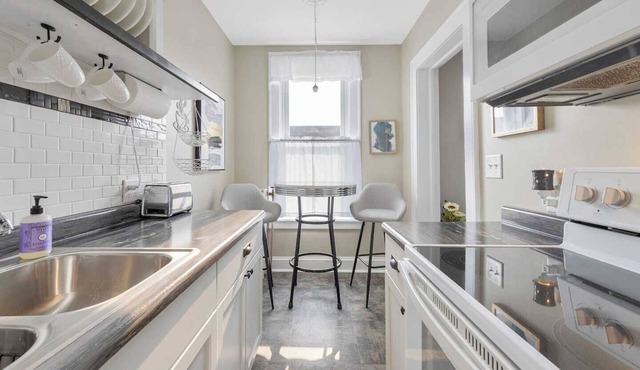 Experience a refined retreat at this elegant apartment situated in the vibrant center of downtown Two Harbors, Minnesota. in Two Harbors