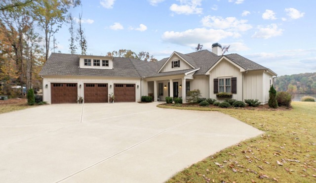 Newer construction, professionally decorated on the water.