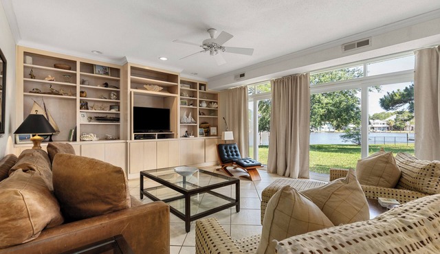 Stair-free home directly on bay with dock, monthly rentals welcome